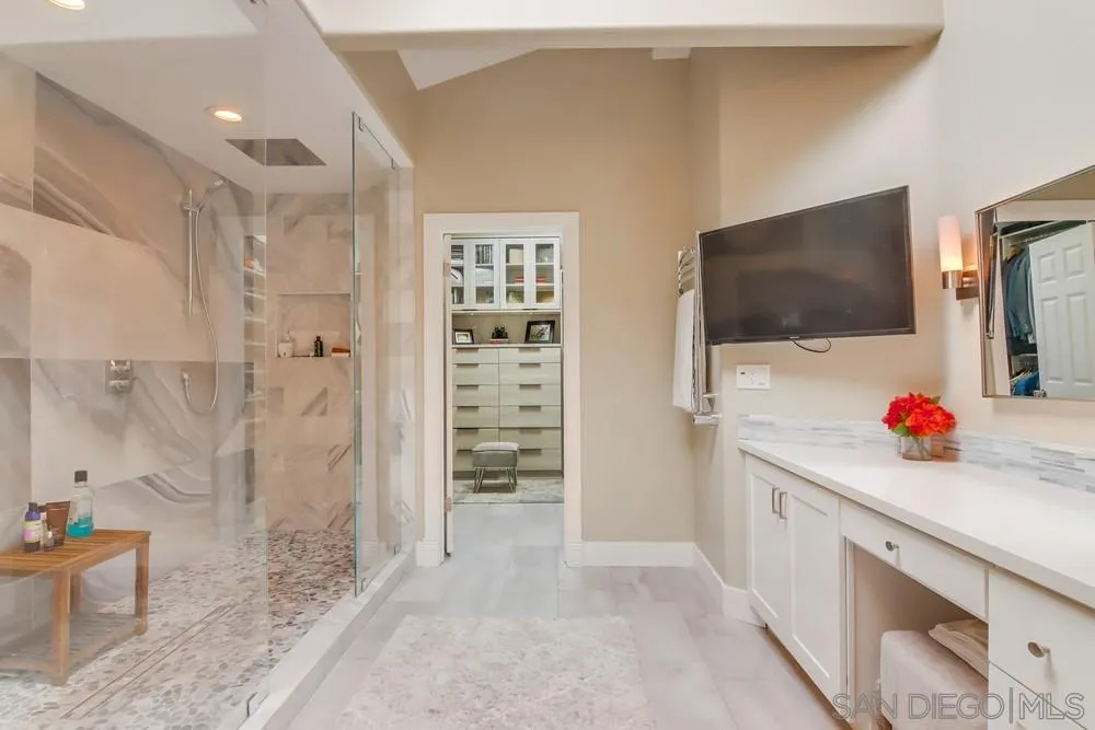 40 Bahama Bend Coronado, CA 92118 - Photo 23 of 36 a view of kitchen with a flat screen tv and refrigerator