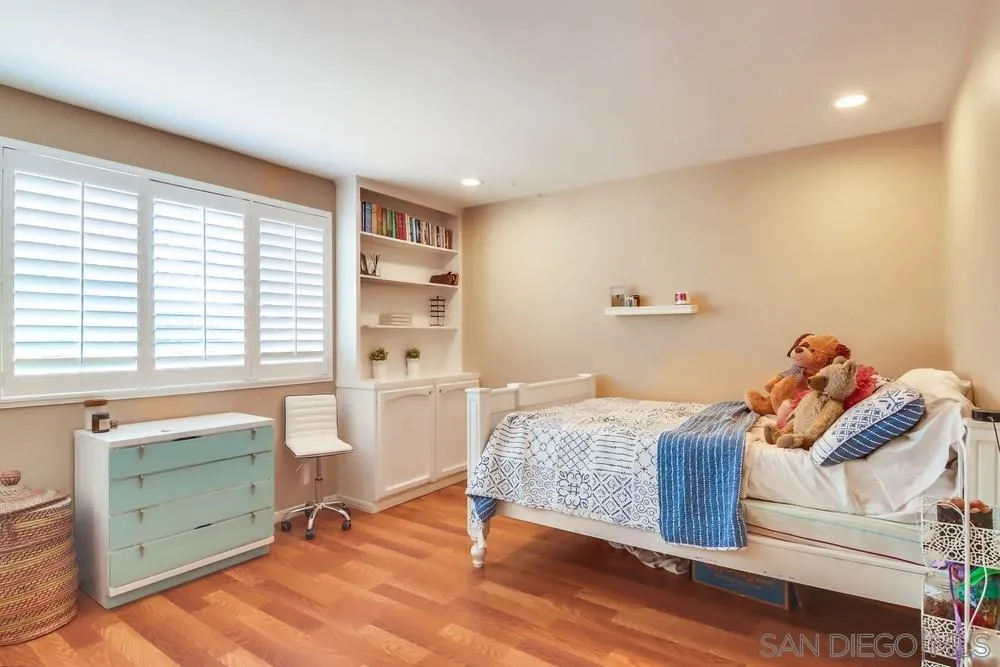 40 Bahama Bend Coronado, CA 92118 - Photo 27 of 36 a bedroom with furniture and a window