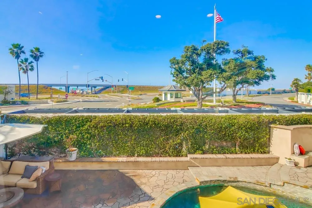 40 Bahama Bend Coronado, CA 92118 - Photo 31 of 36 a view of a swimming pool and a yard