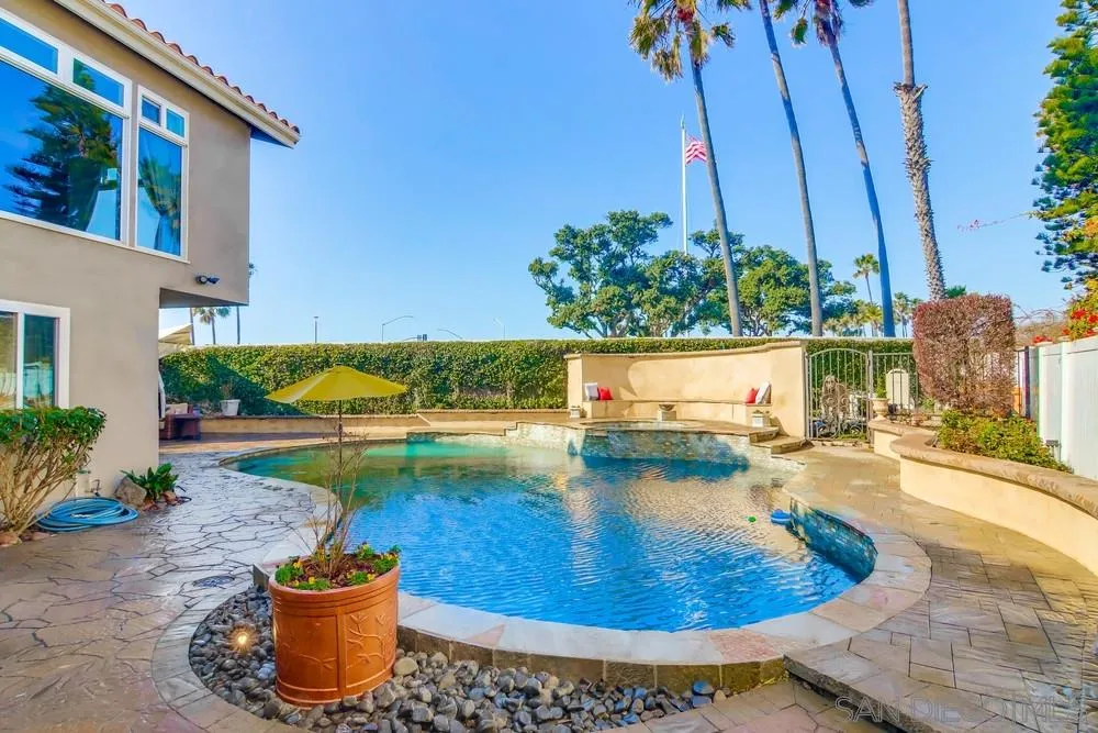40 Bahama Bend Coronado, CA 92118 - Photo 32 of 36 a view of a swimming pool with a yard