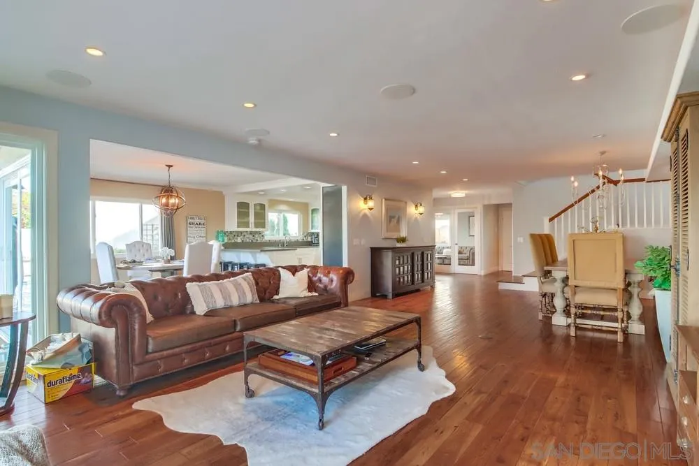 40 Bahama Bend Coronado, CA 92118 - Photo 6 of 36 a living room with furniture and a wooden floor
