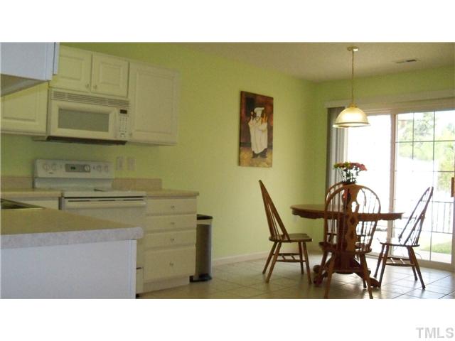 11311 Involute Place, Unit 103 Raleigh, NC 27617 - Photo 4 of 12 Light, bright, and white kitchen! Plenty of space to let your inner Emerald Shine!