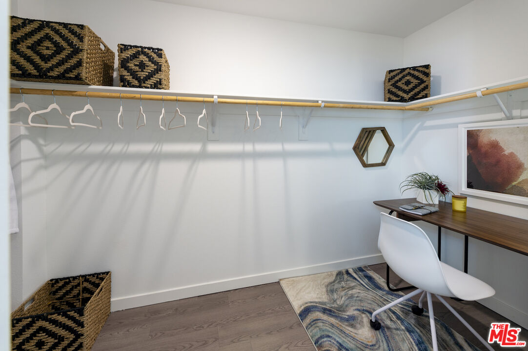 2929 Pennsylvania Avenue, Unit 111 Santa Monica, CA 90404 - Photo 14 of 28 a view of kitchen island with wooden floor