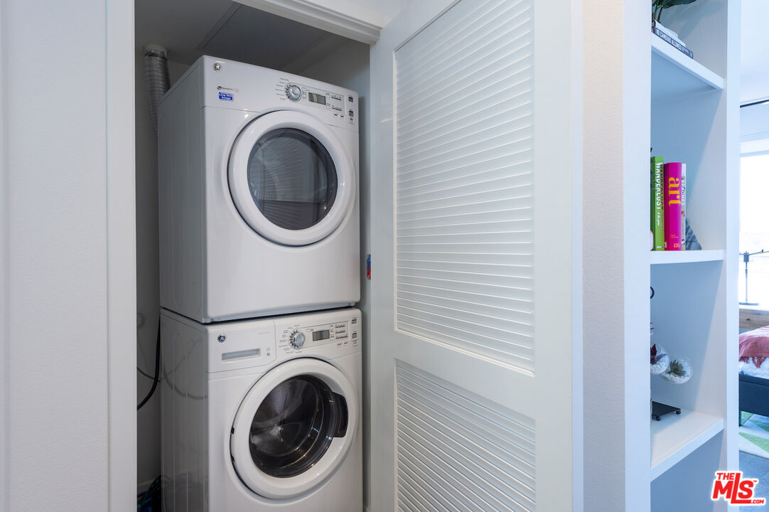 2929 Pennsylvania Avenue, Unit 111 Santa Monica, CA 90404 - Photo 16 of 28 a view of a hallway with washer and dryer