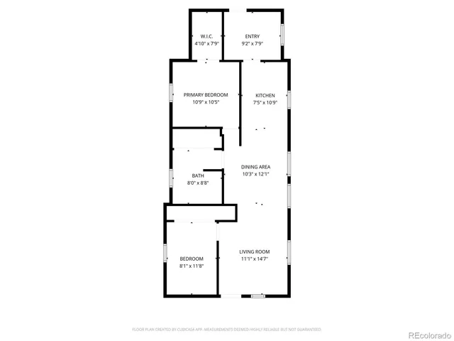 a picture of a bench in front of a wall