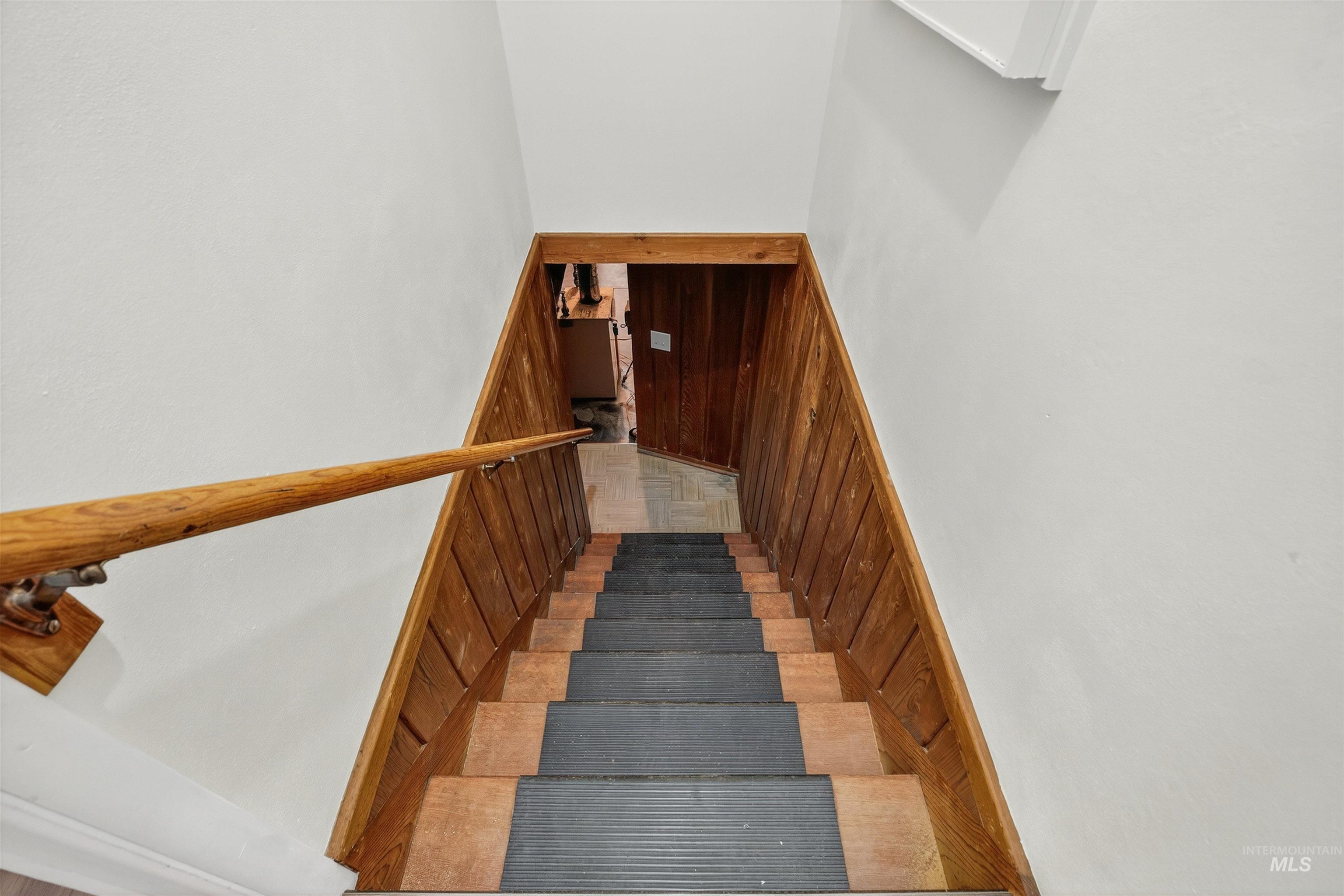 164 State Street Juliaetta, ID 83535 - Photo 24 of 37 Staircase with wood walls