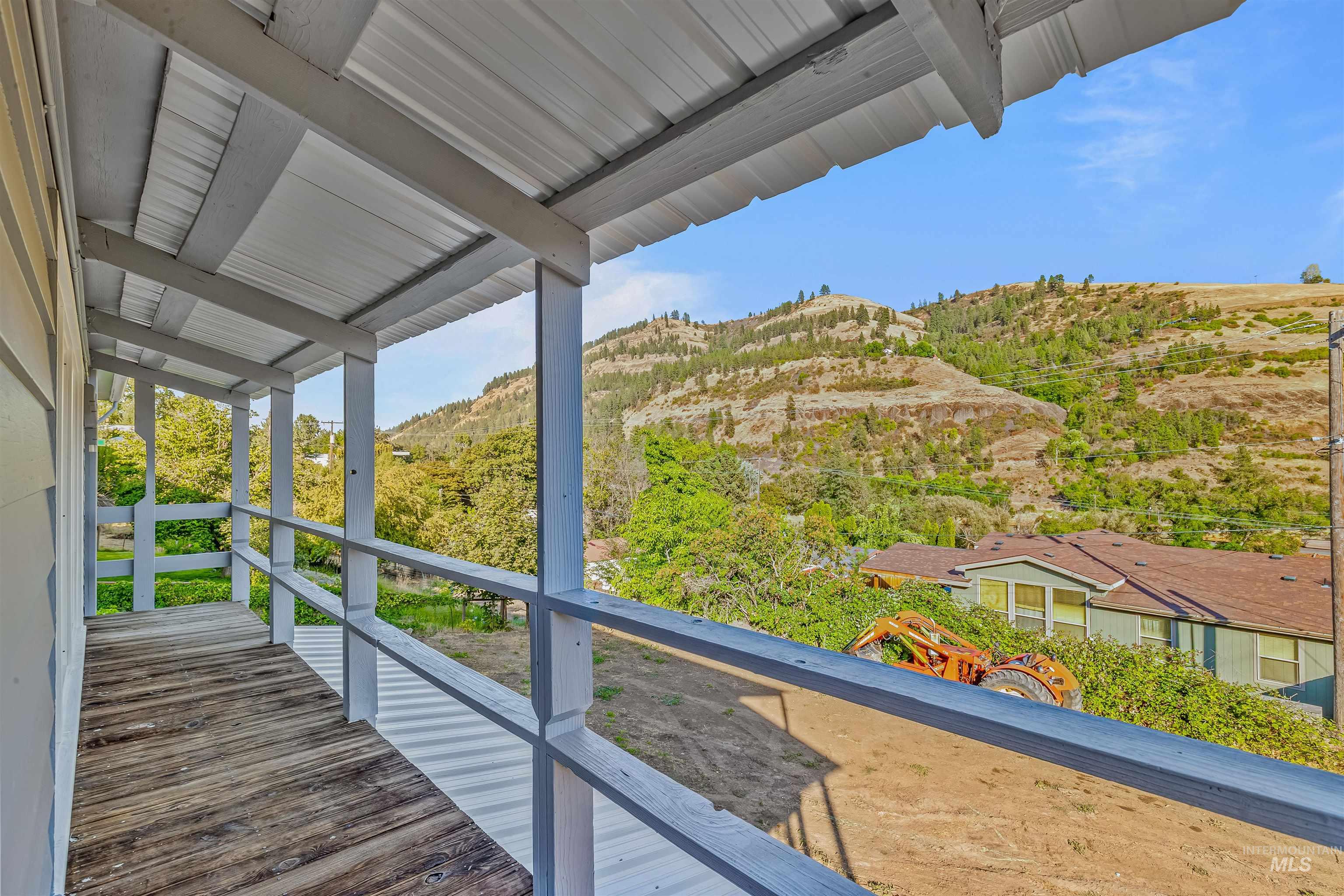 164 State Street Juliaetta, ID 83535 - Photo 37 of 37 Wooden deck featuring a mountain view