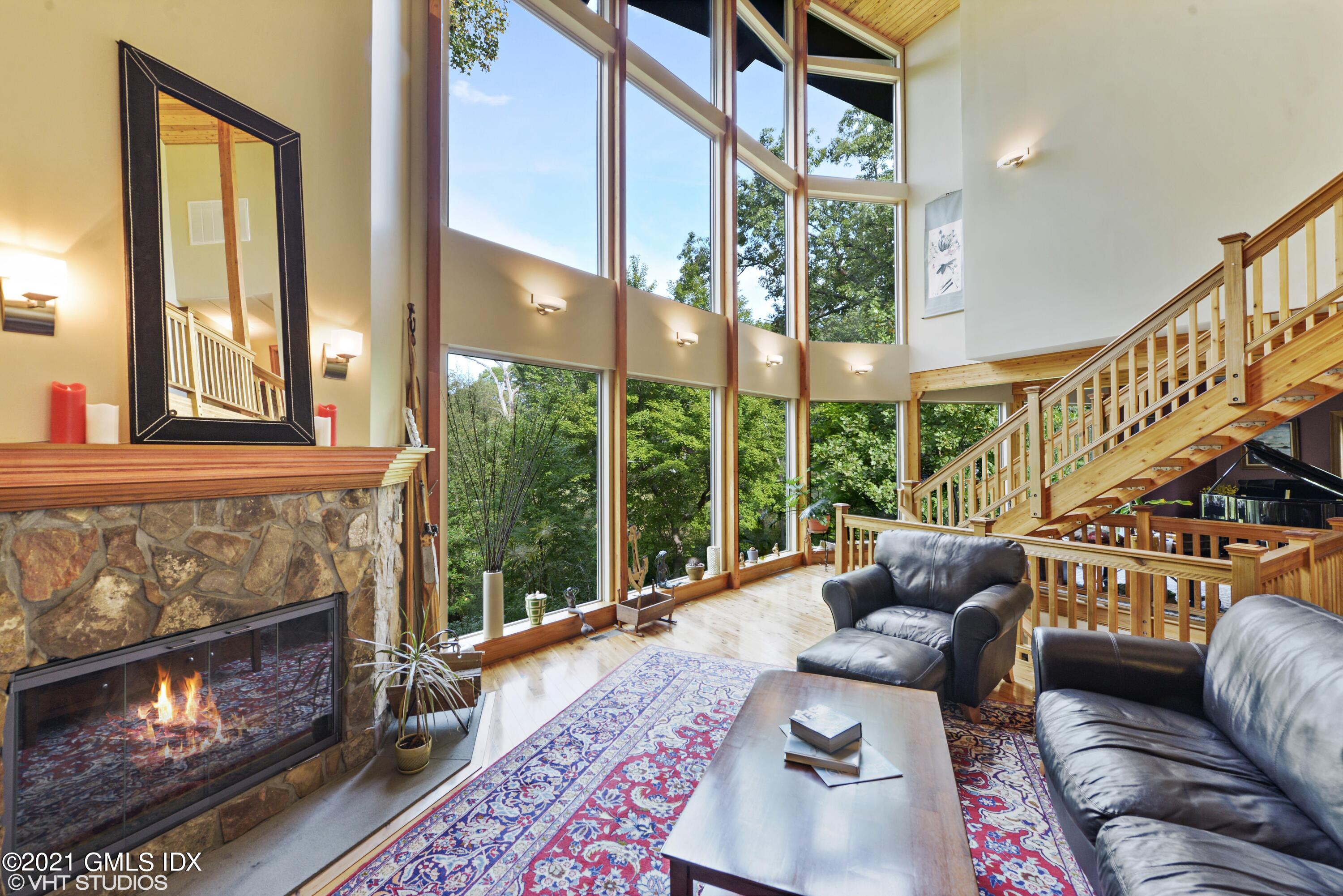 78 Long Meadow Road Riverside, CT 06878 - Photo 3 of 18 a living room with furniture and a fireplace