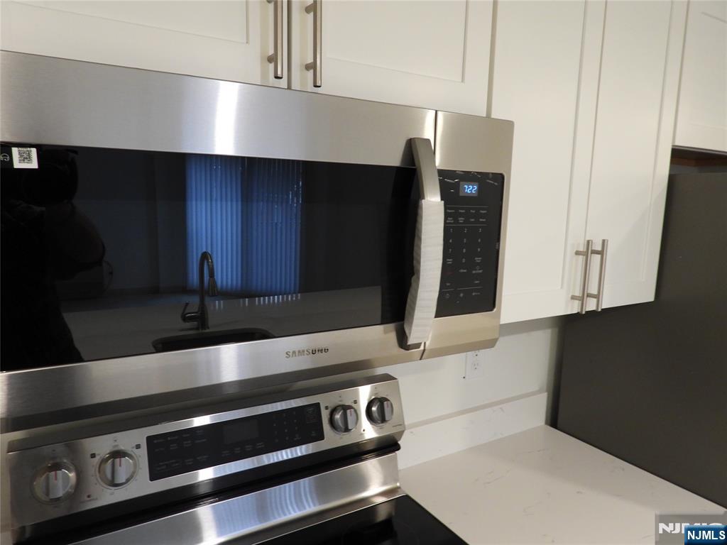 55 Clinton Place, Unit 301 Hackensack, NJ 07601 - Photo 11 of 17 a close view of stove