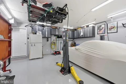 a bed room with a bed and a desk