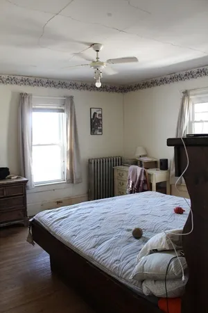 a room with furniture and a window