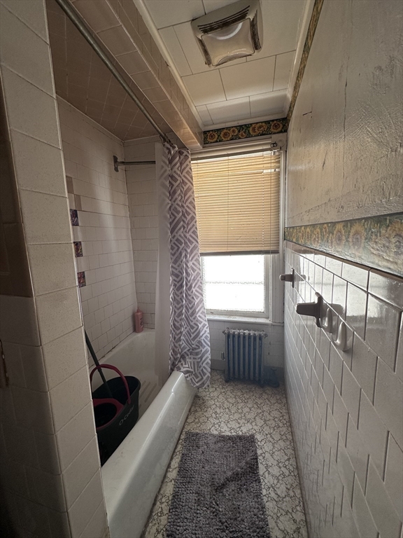 19 Smith Avenue Ware, MA 01082 - Photo 19 of 25 a bathroom with a tub sink toilet and window