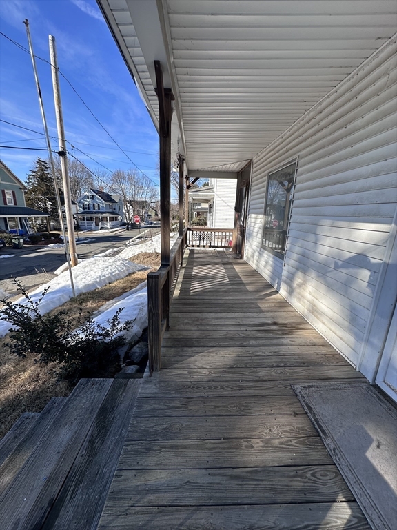 19 Smith Avenue Ware, MA 01082 - Photo 3 of 25 a view of a balcony with wooden floor