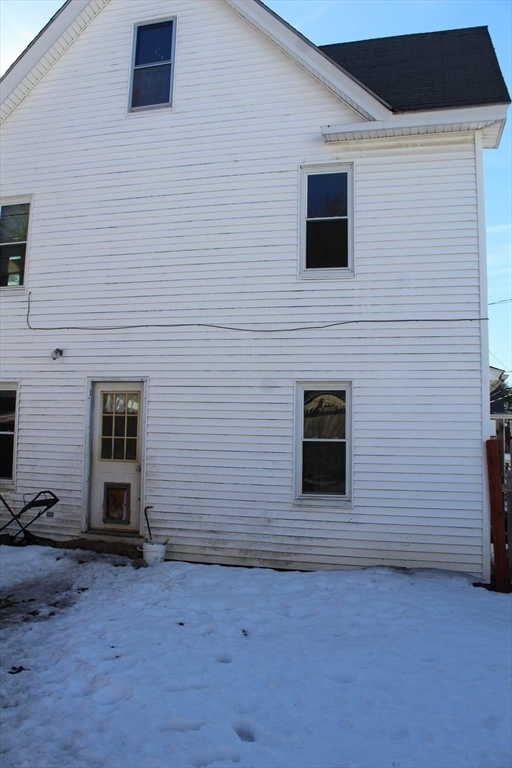 19 Smith Avenue Ware, MA 01082 - Photo 5 of 25 a view of a brick house with an empty space