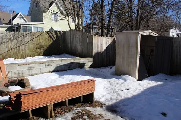 a kitchen with a table and chairs in it