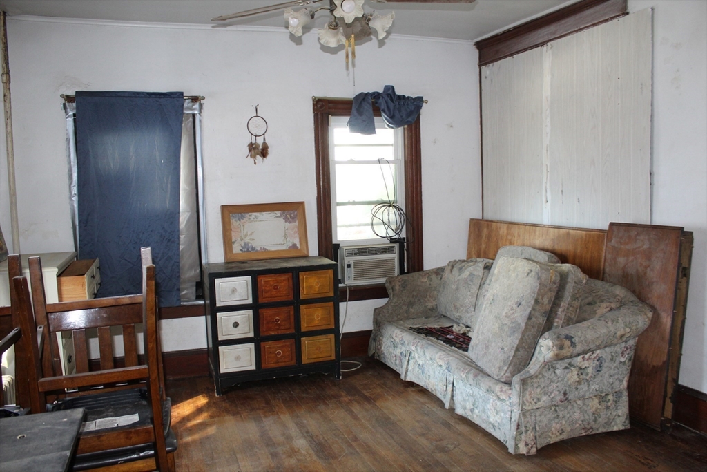 19 Smith Avenue Ware, MA 01082 - Photo 10 of 25 a living room with furniture and a window