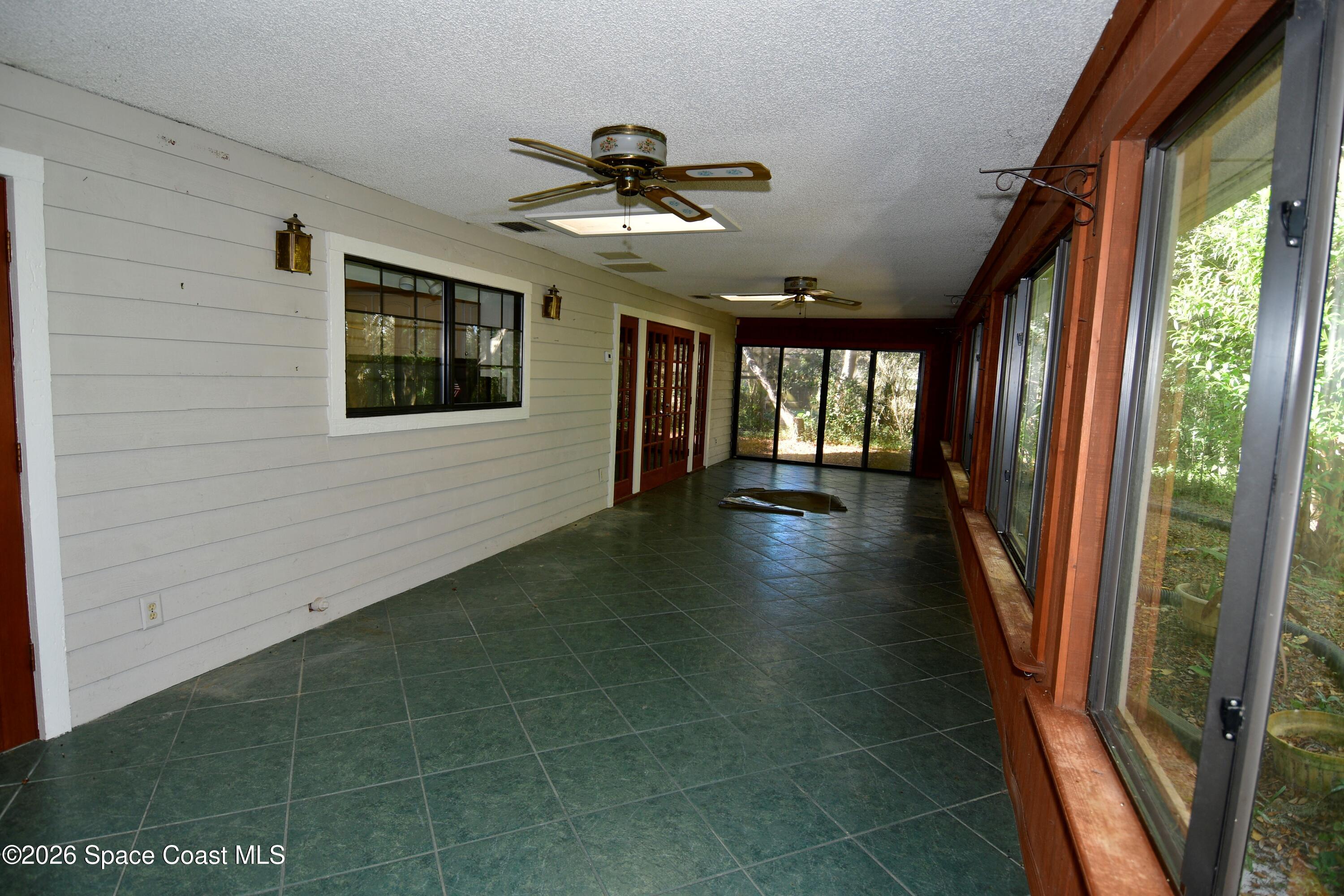 3624 Thal Road Titusville, FL 32796 - Photo 15 of 26 Under Air Enclosed Porch off Family Room