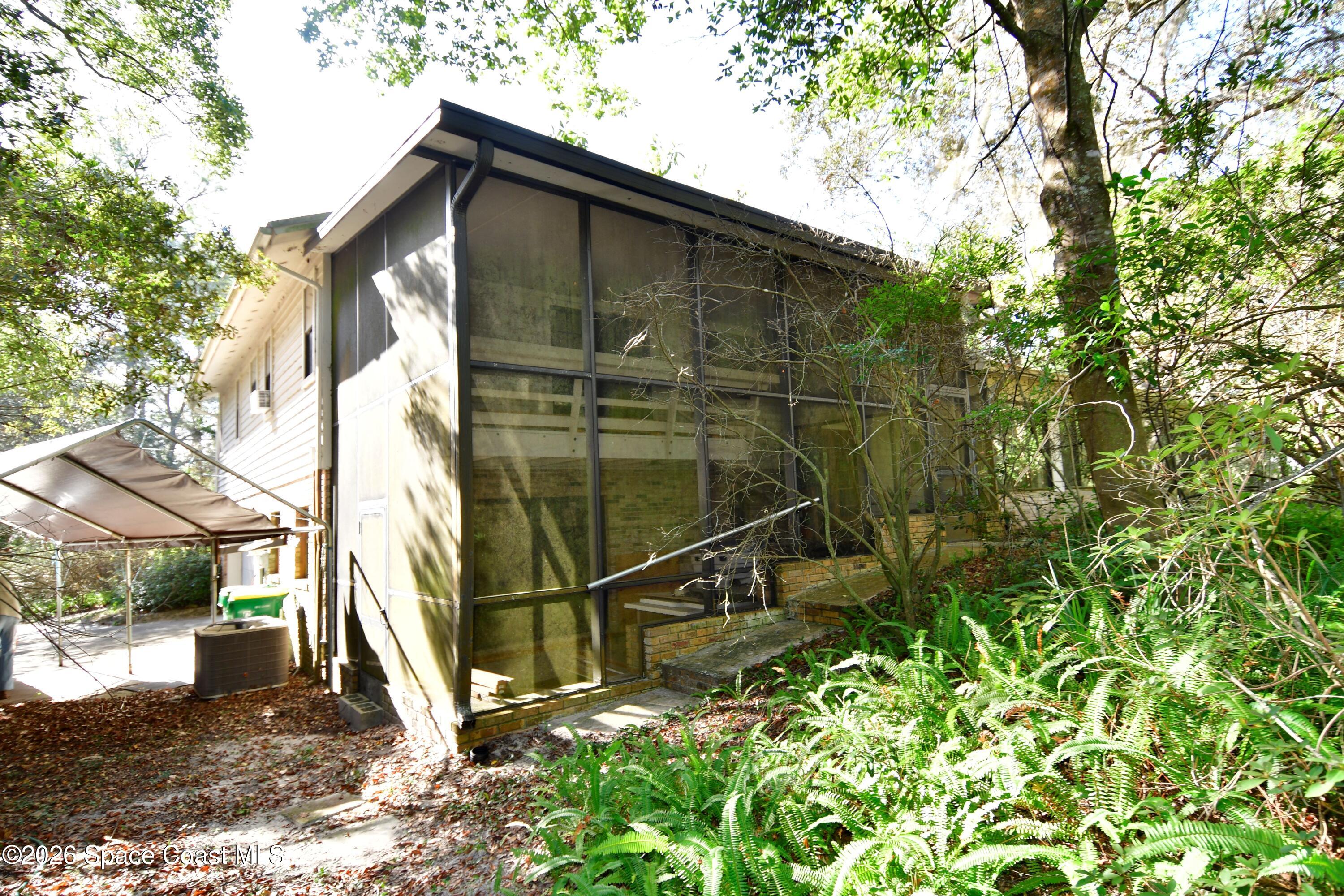 3624 Thal Road Titusville, FL 32796 - Photo 4 of 26 3624 Thal Rd Rear View