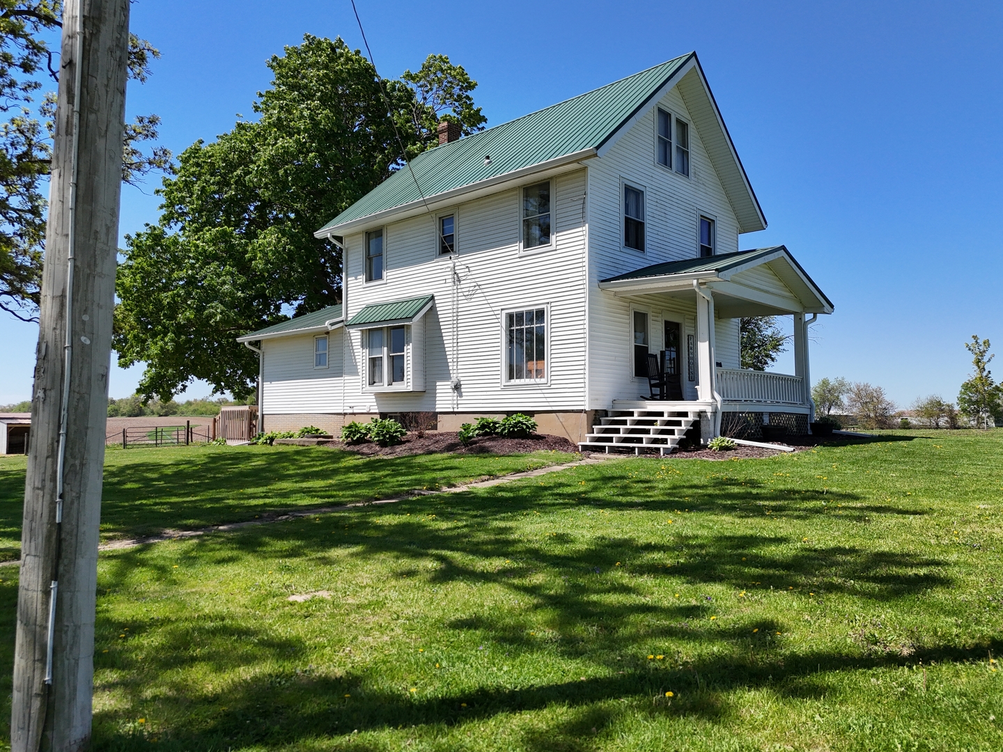 4895 West Stephenson St Road Freeport, IL 61032 - Photo 11 of 66 a front view of a house with a yard
