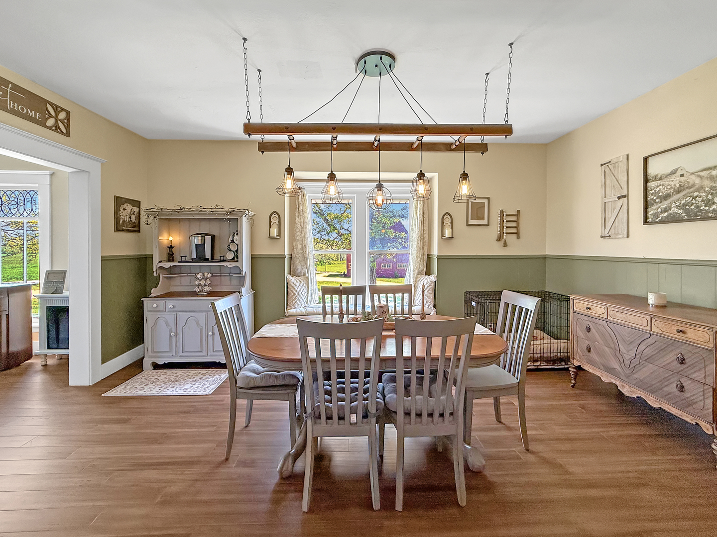4895 West Stephenson St Road Freeport, IL 61032 - Photo 28 of 66 a dining room with furniture window and wooden floor