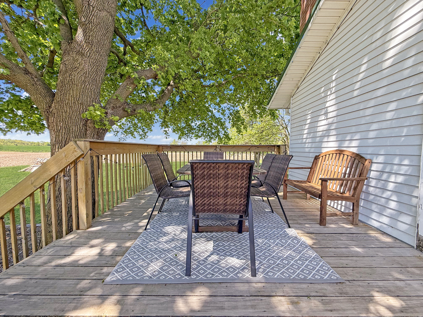 4895 West Stephenson St Road Freeport, IL 61032 - Photo 58 of 66 a view of a chairs and table on the wooden floor