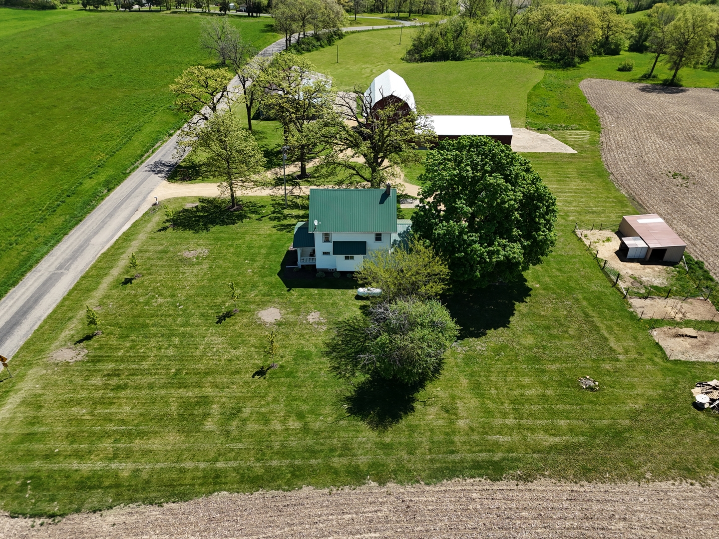 4895 West Stephenson St Road Freeport, IL 61032 - Photo 60 of 66 a backyard of a house with lots of green space