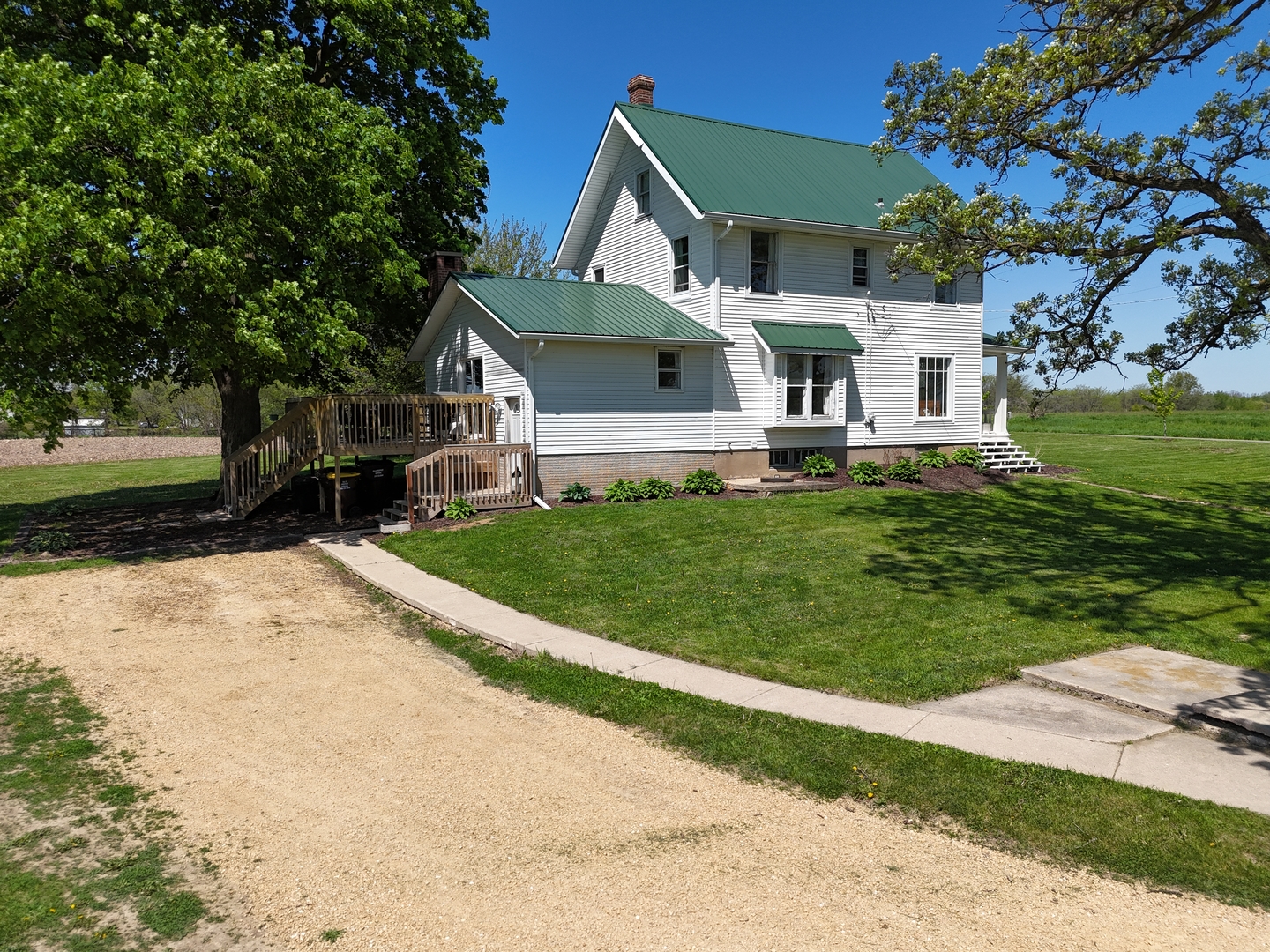 4895 West Stephenson St Road Freeport, IL 61032 - Photo 63 of 66 a front view of a house with a yard
