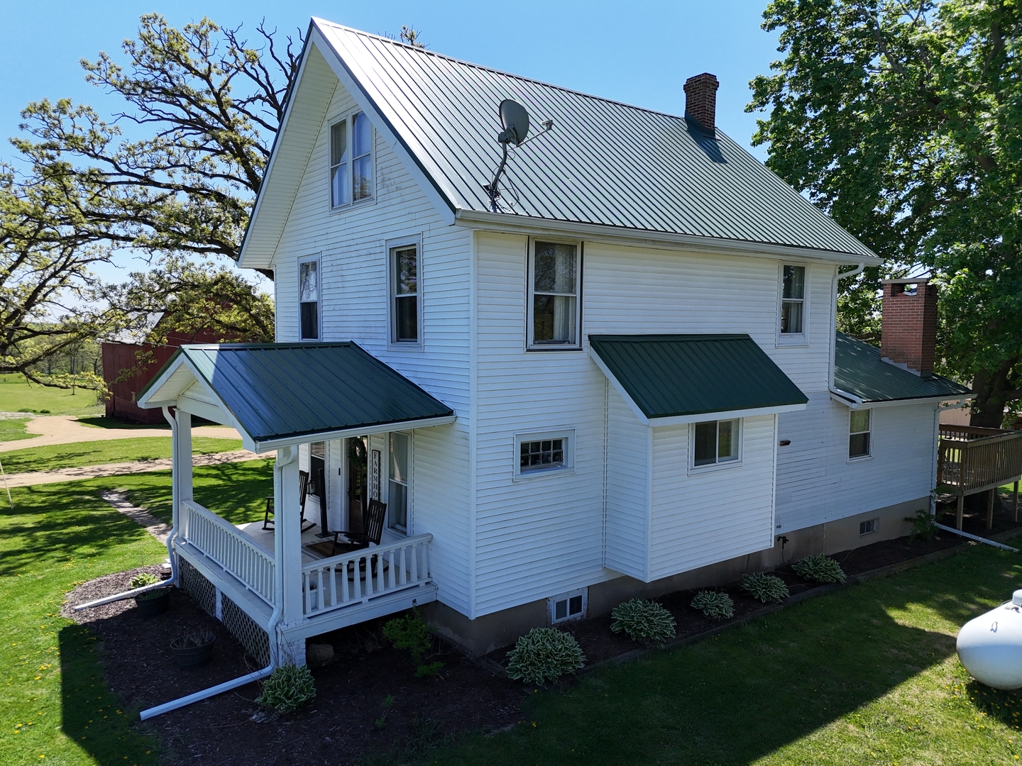 4895 West Stephenson St Road Freeport, IL 61032 - Photo 65 of 66 a front view of a house with garden
