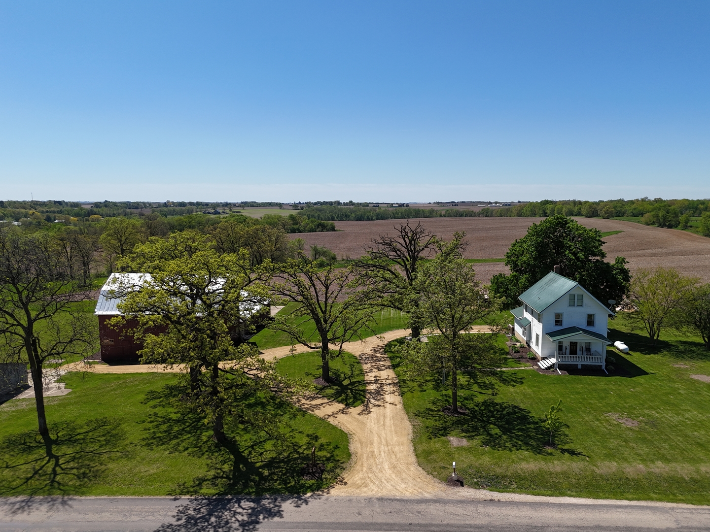 4895 West Stephenson St Road Freeport, IL 61032 - Photo 9 of 66 a view of a lake with houses