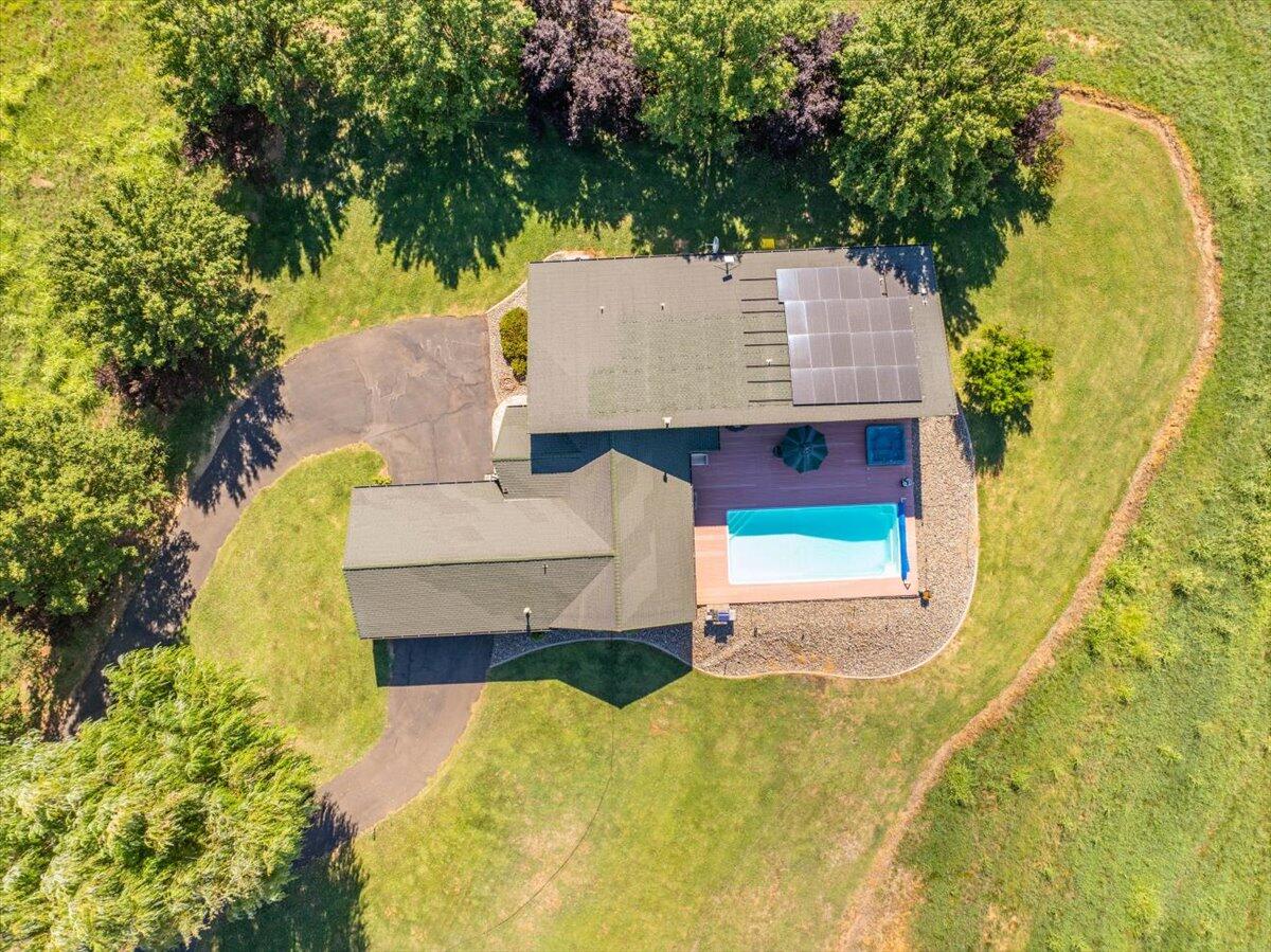 4208 Balls Ferry Road Cottonwood, CA 96022 - Photo 4 of 73 a view of a house with pool and trees