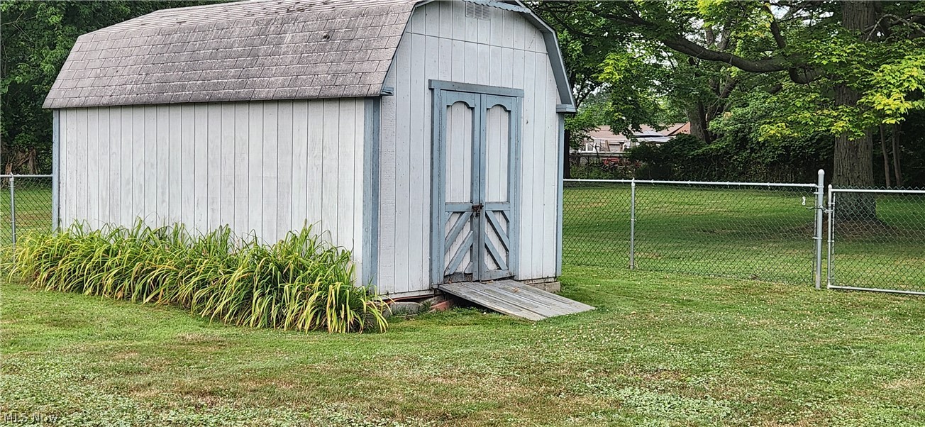5852 Lake Road Mentor, OH 44060 - Photo 37 of 45 View of outdoor structure with a lawn