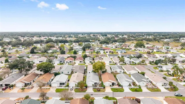 an aerial view of residential building with parking space