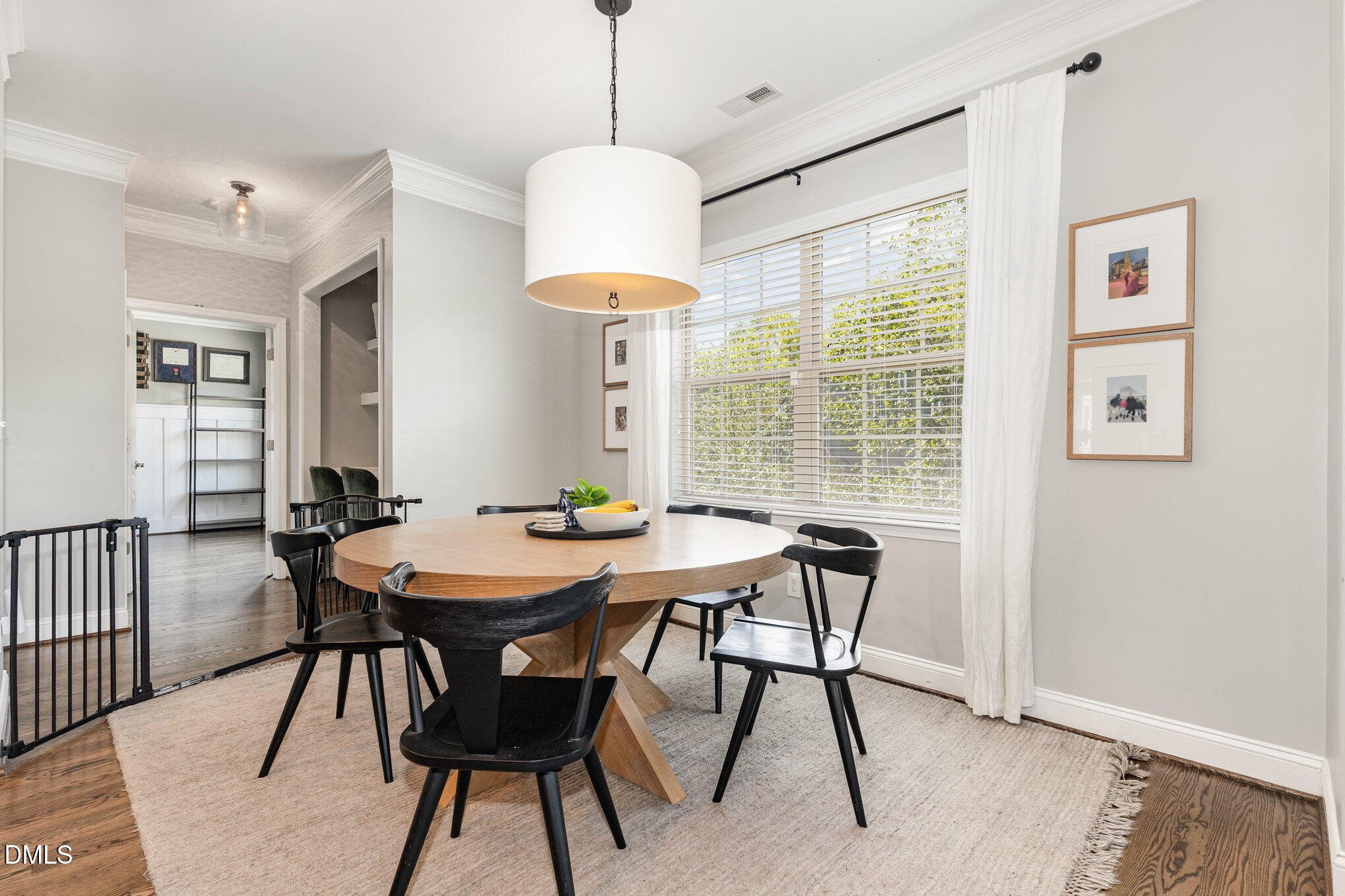 1956 Lazio Lane Apex, NC 27502 - Photo 18 of 47 a view of a dining room with furniture window and outside view
