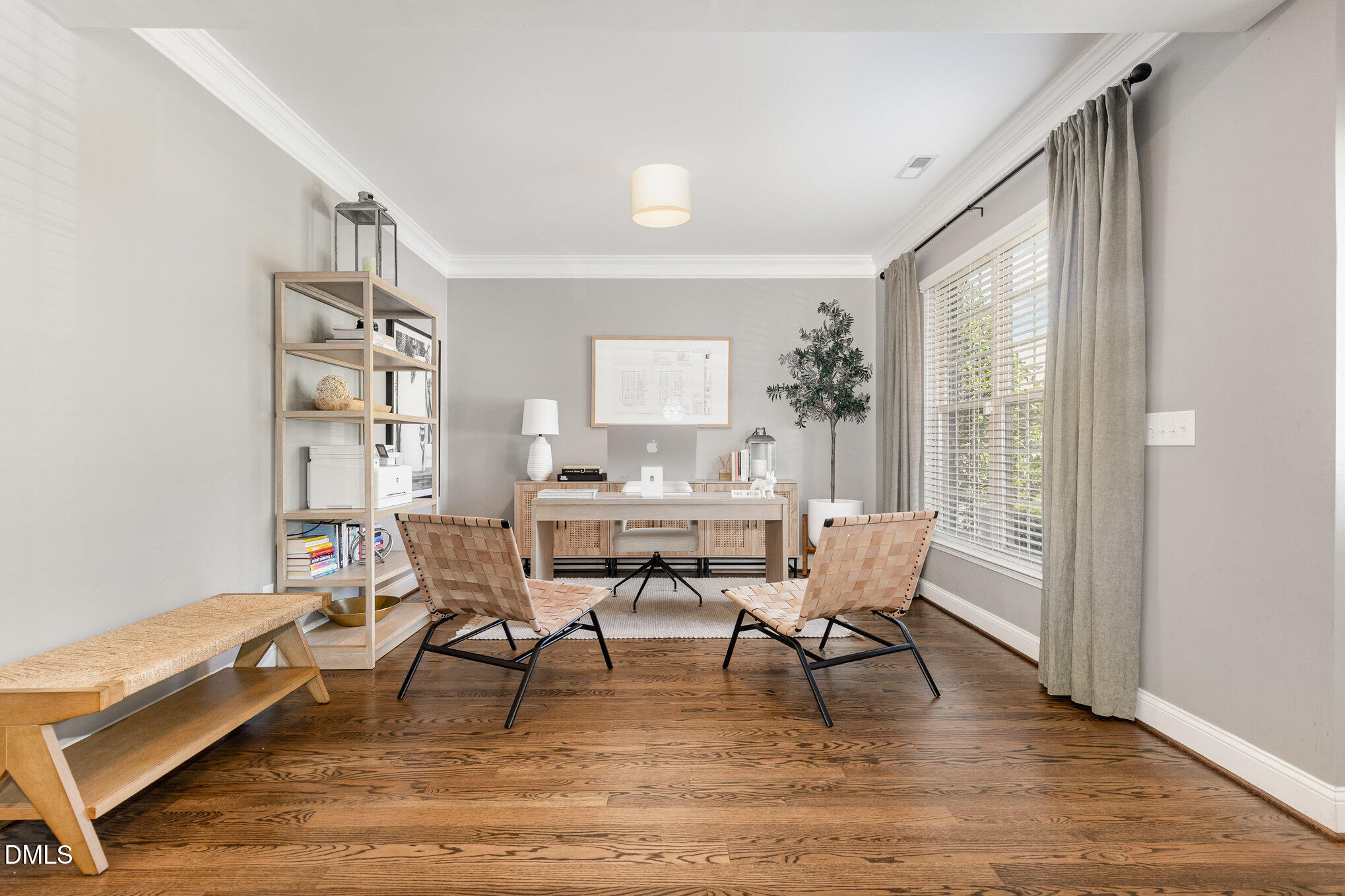 1956 Lazio Lane Apex, NC 27502 - Photo 3 of 47 a view of a dining room with furniture and wooden floor