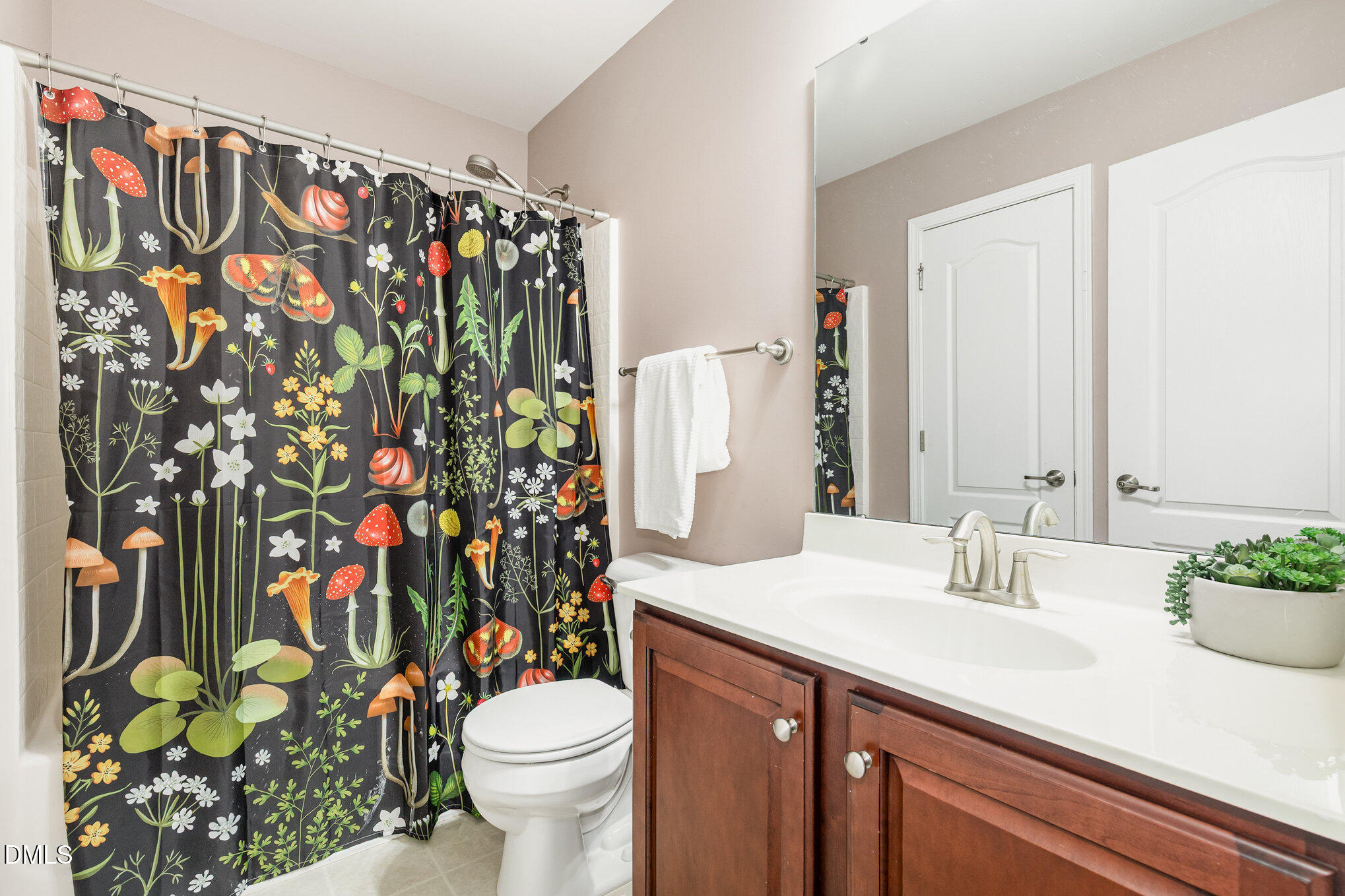 1956 Lazio Lane Apex, NC 27502 - Photo 35 of 47 a bathroom with a sink toilet and shower
