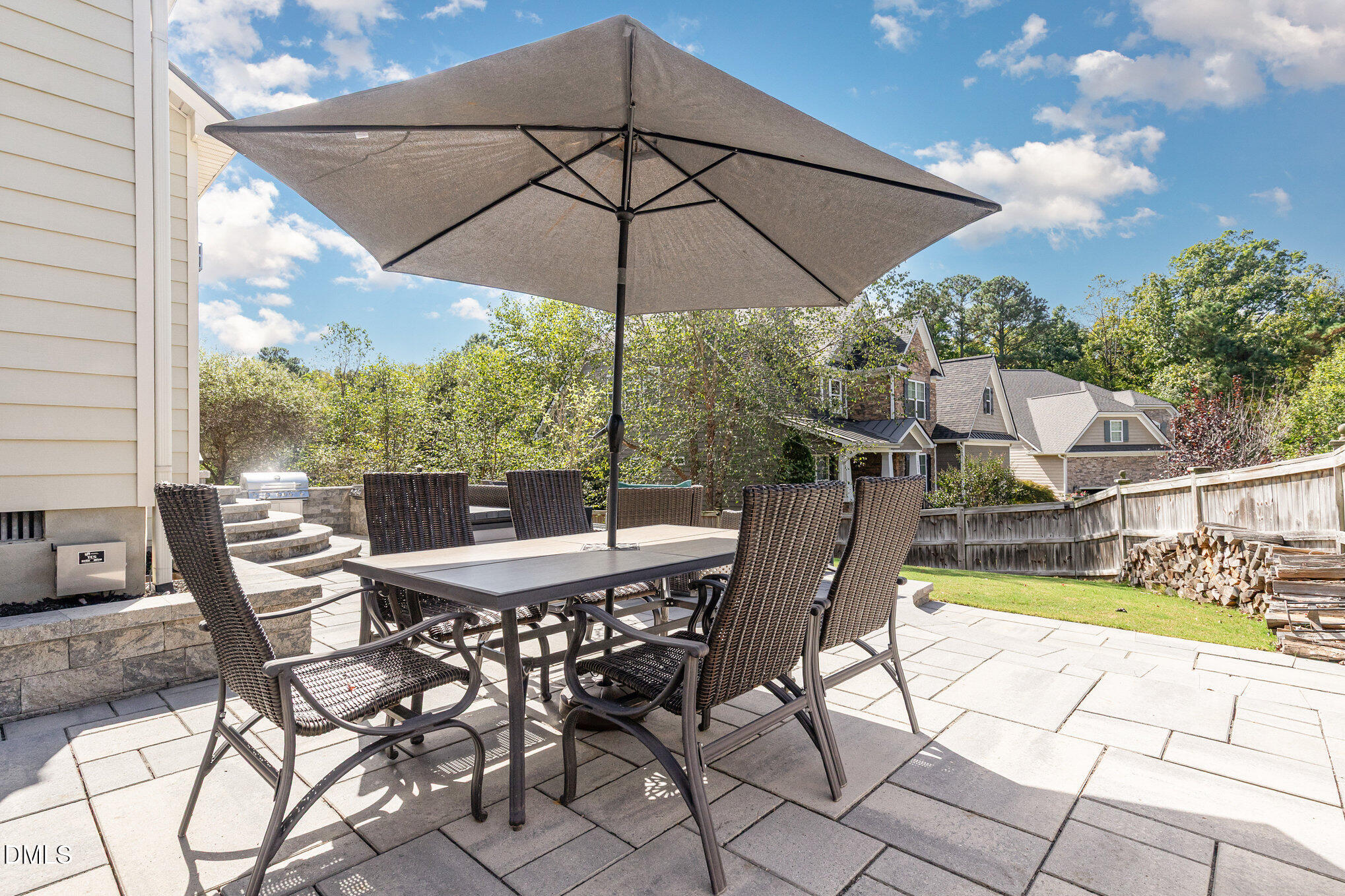 1956 Lazio Lane Apex, NC 27502 - Photo 37 of 47 a view of a chairs and table in the patio