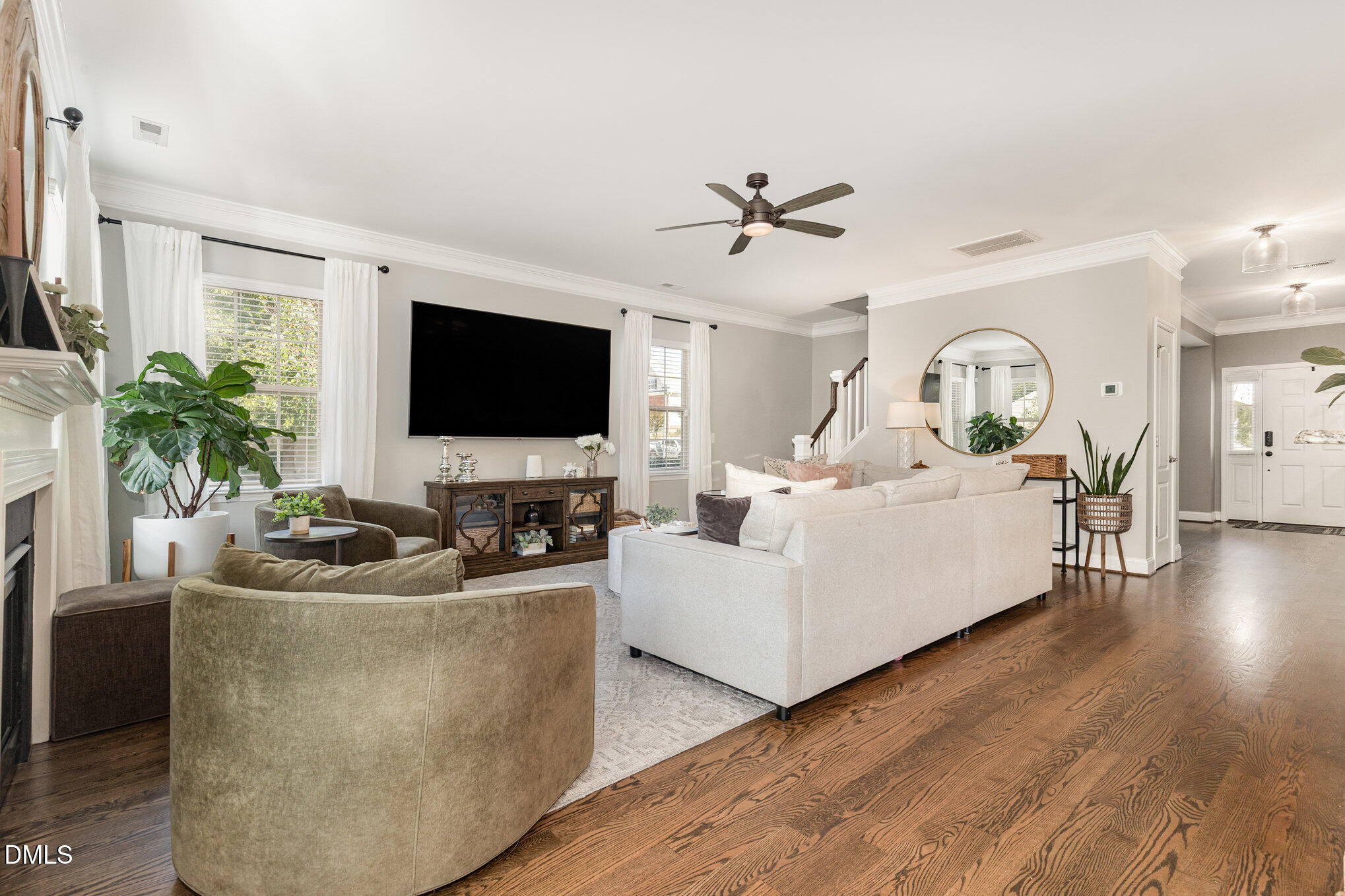 1956 Lazio Lane Apex, NC 27502 - Photo 9 of 47 a living room with furniture and a flat screen tv
