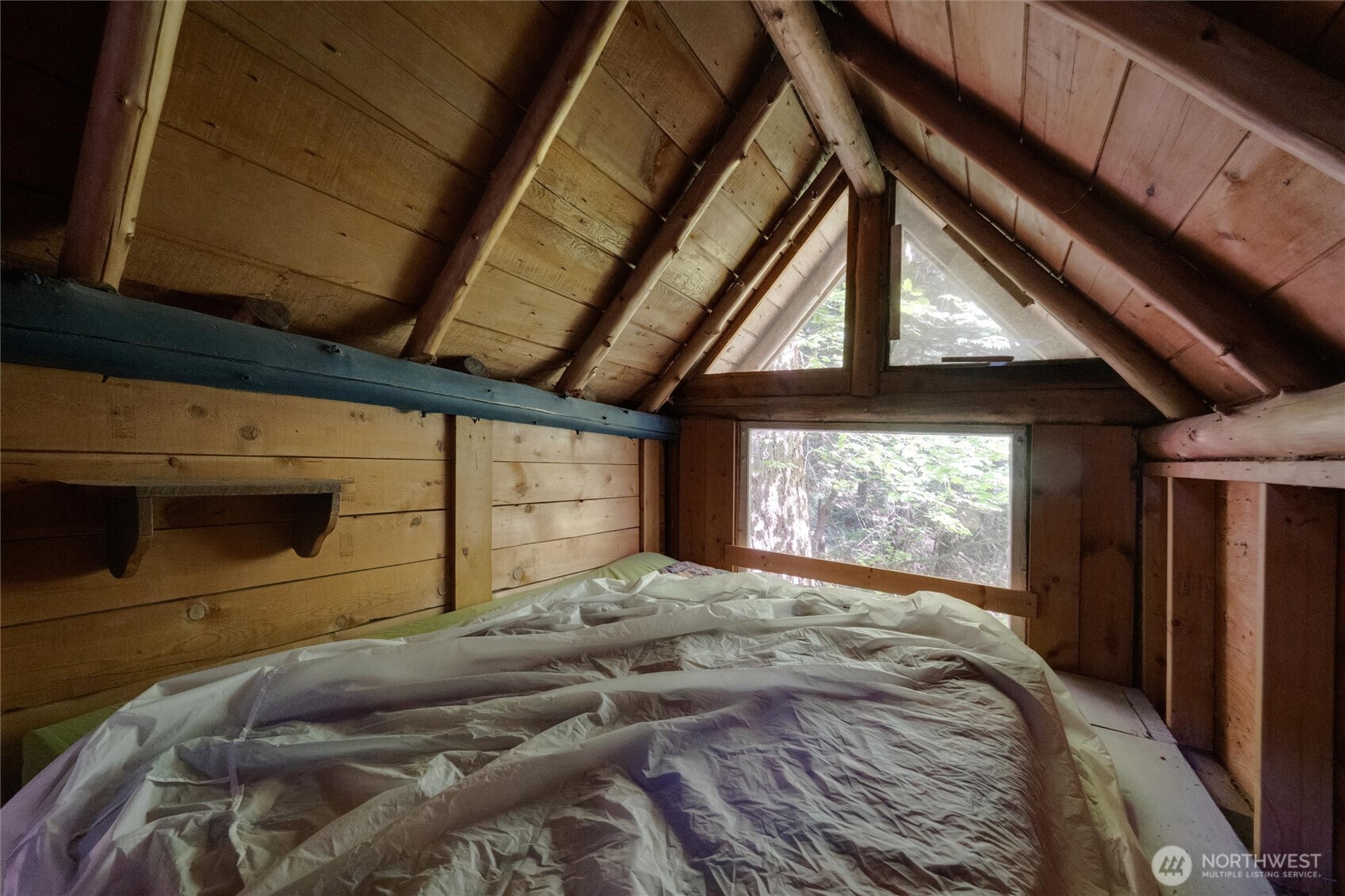4315 Nordum Road Everson, WA 98247 - Photo 38 of 40 a bed sitting in a bedroom next to a window