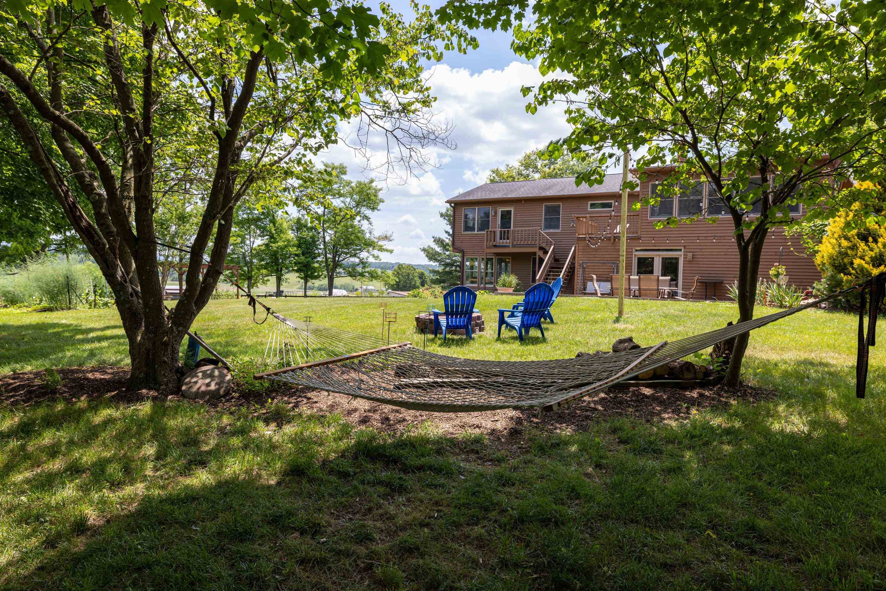 3980 Greenmount Road Harrisonburg, VA 22802 - Photo 55 of 75 The backyard space offers landscaping, a level backyard with a fence, and stunning view surrounding the home!
