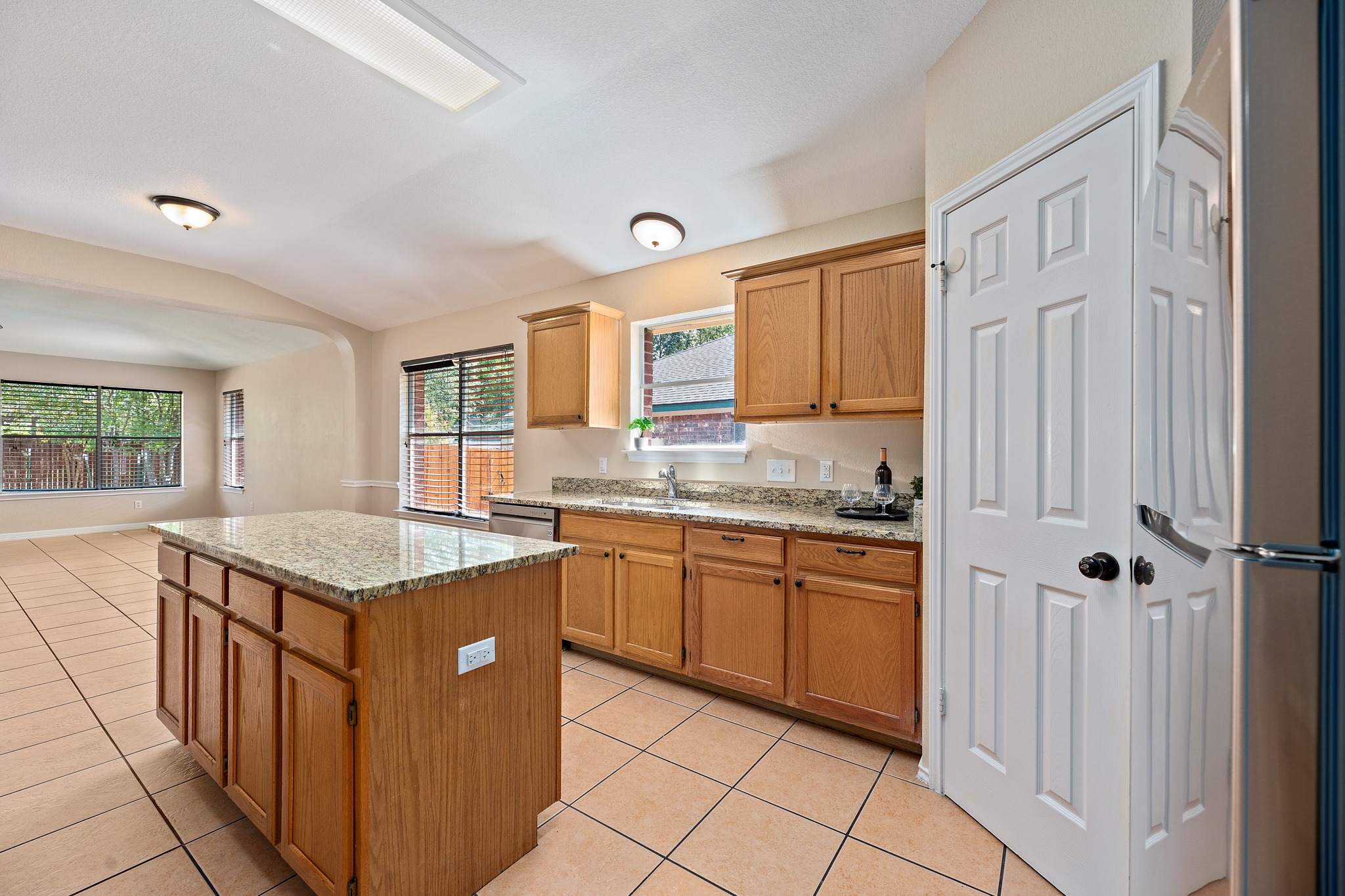 1208 Lochaline Loop Pflugerville, TX 78660 - Photo 10 of 40 Great Kitchen with Center Island and Granite Countertops