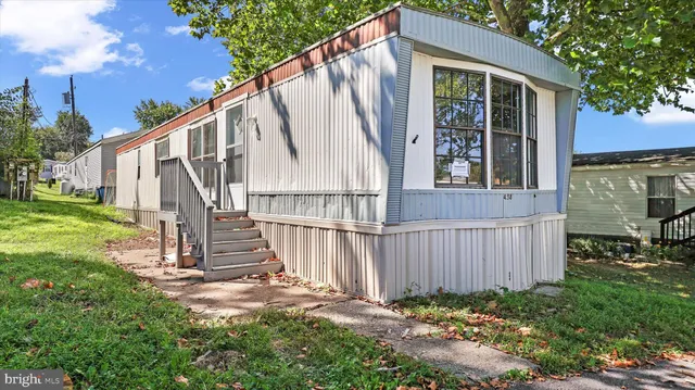 a view of backyard with green space