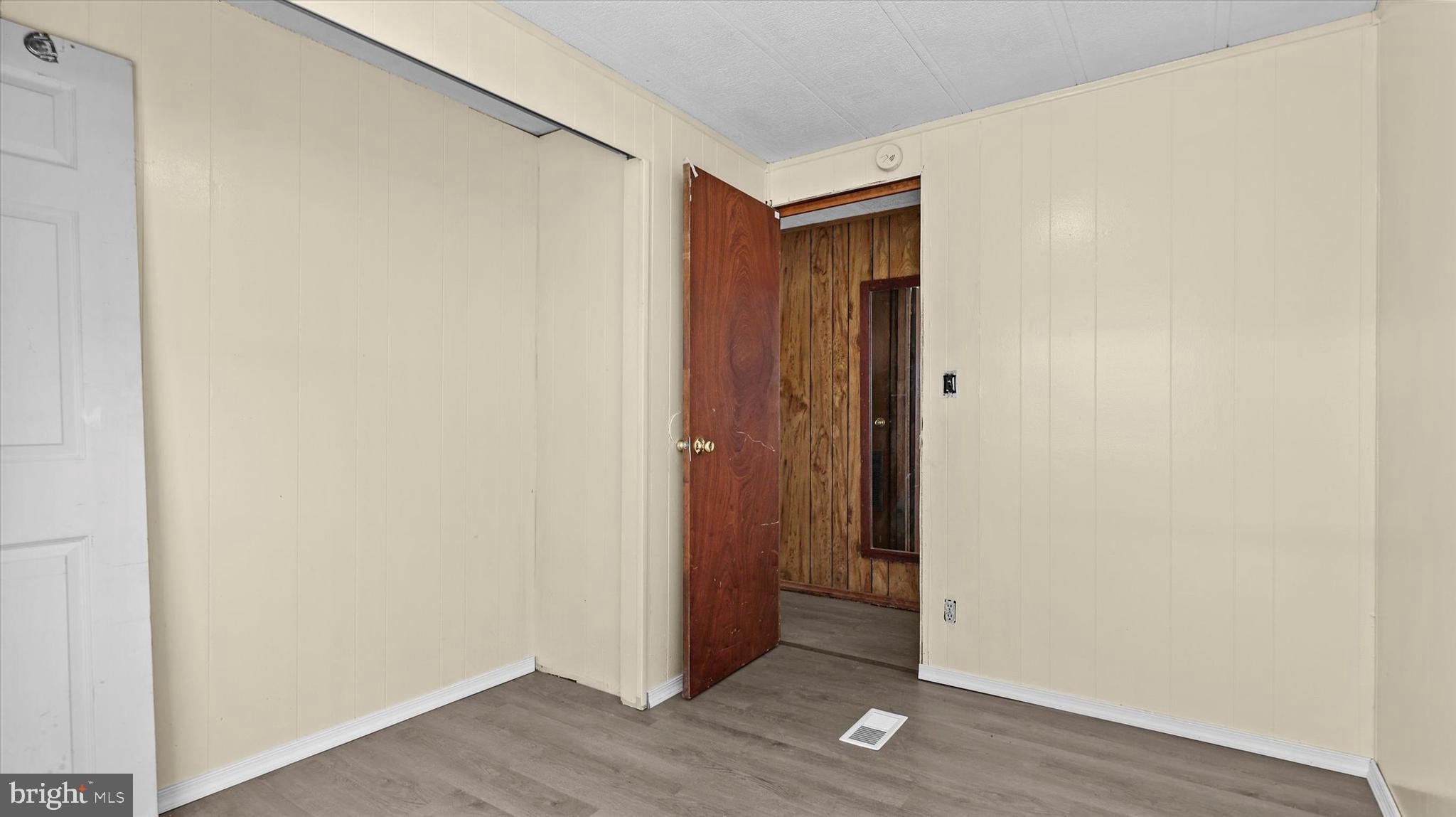 4518 Rolo Court Mechanicsburg, PA 17055 - Photo 11 of 16 an empty room with wooden floor