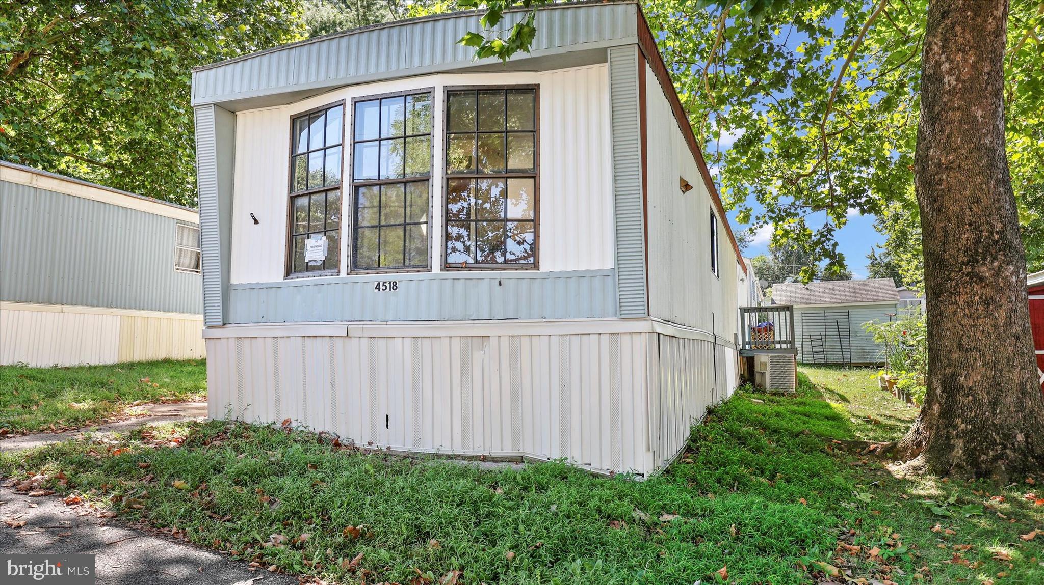 4518 Rolo Court Mechanicsburg, PA 17055 - Photo 2 of 16 a front view of a house with garden