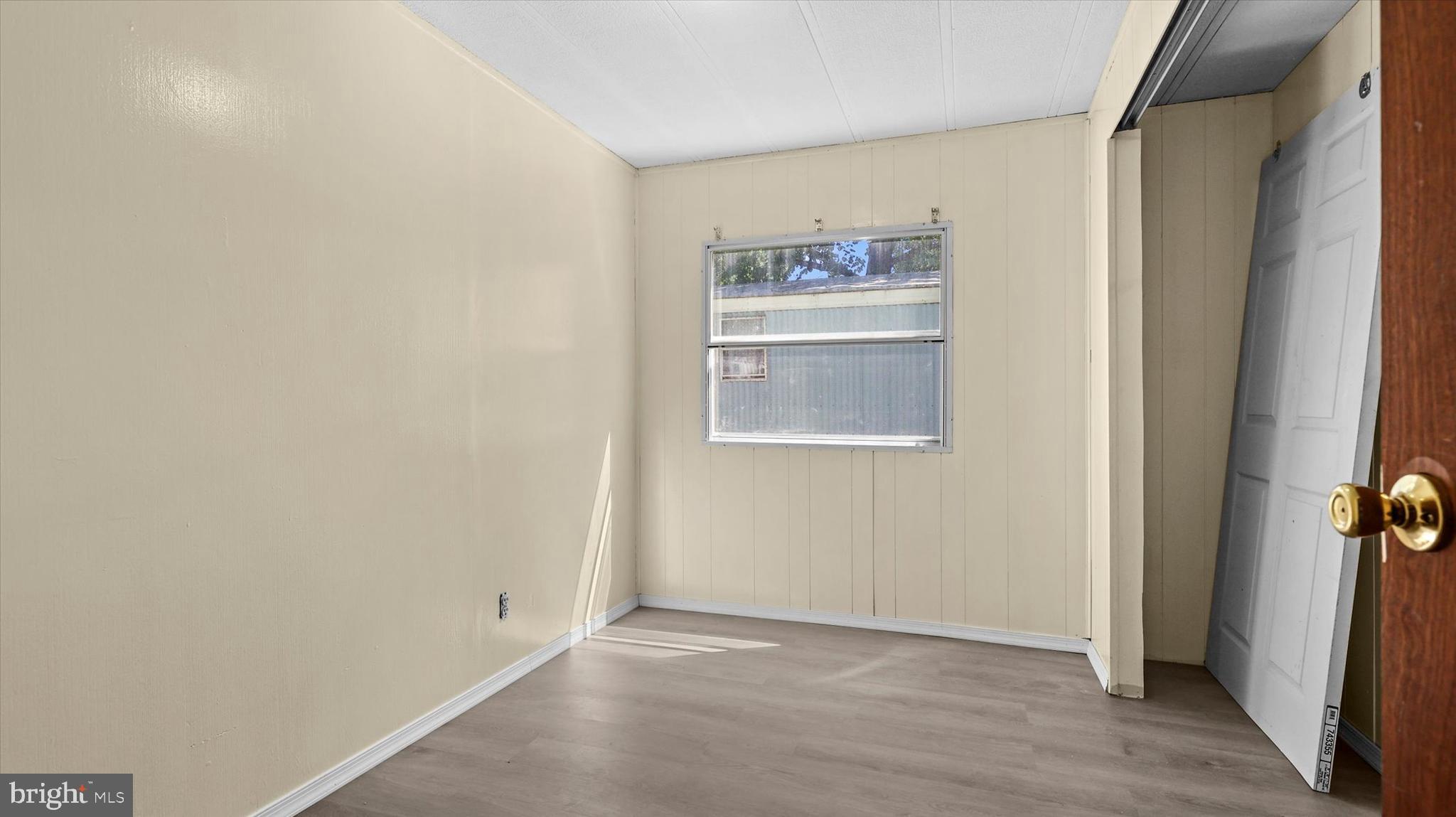 4518 Rolo Court Mechanicsburg, PA 17055 - Photo 10 of 16 an empty room with windows