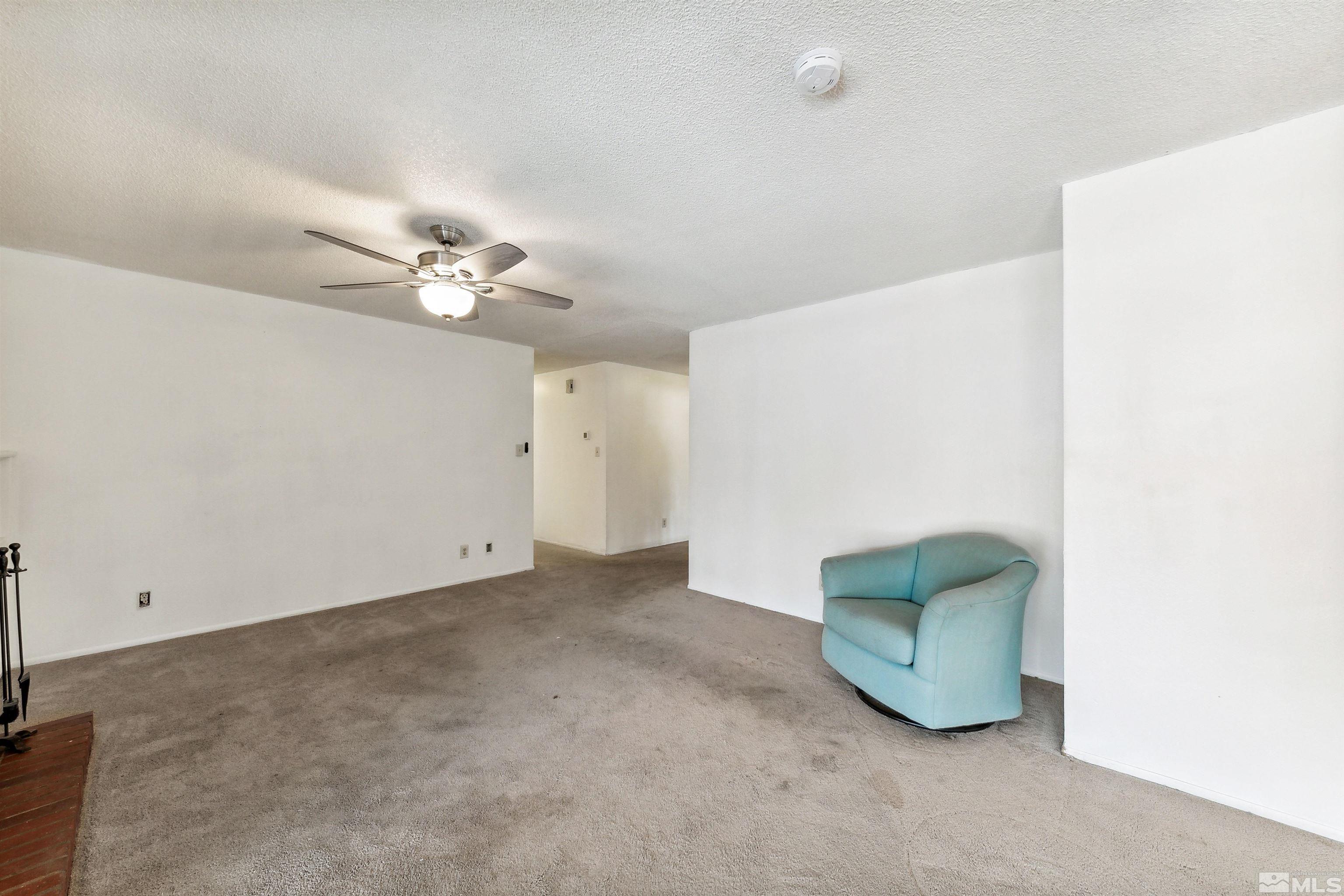 1950 Prince Way Reno, NV 89503 - Photo 14 of 17 a view of an empty room with a chandelier fan