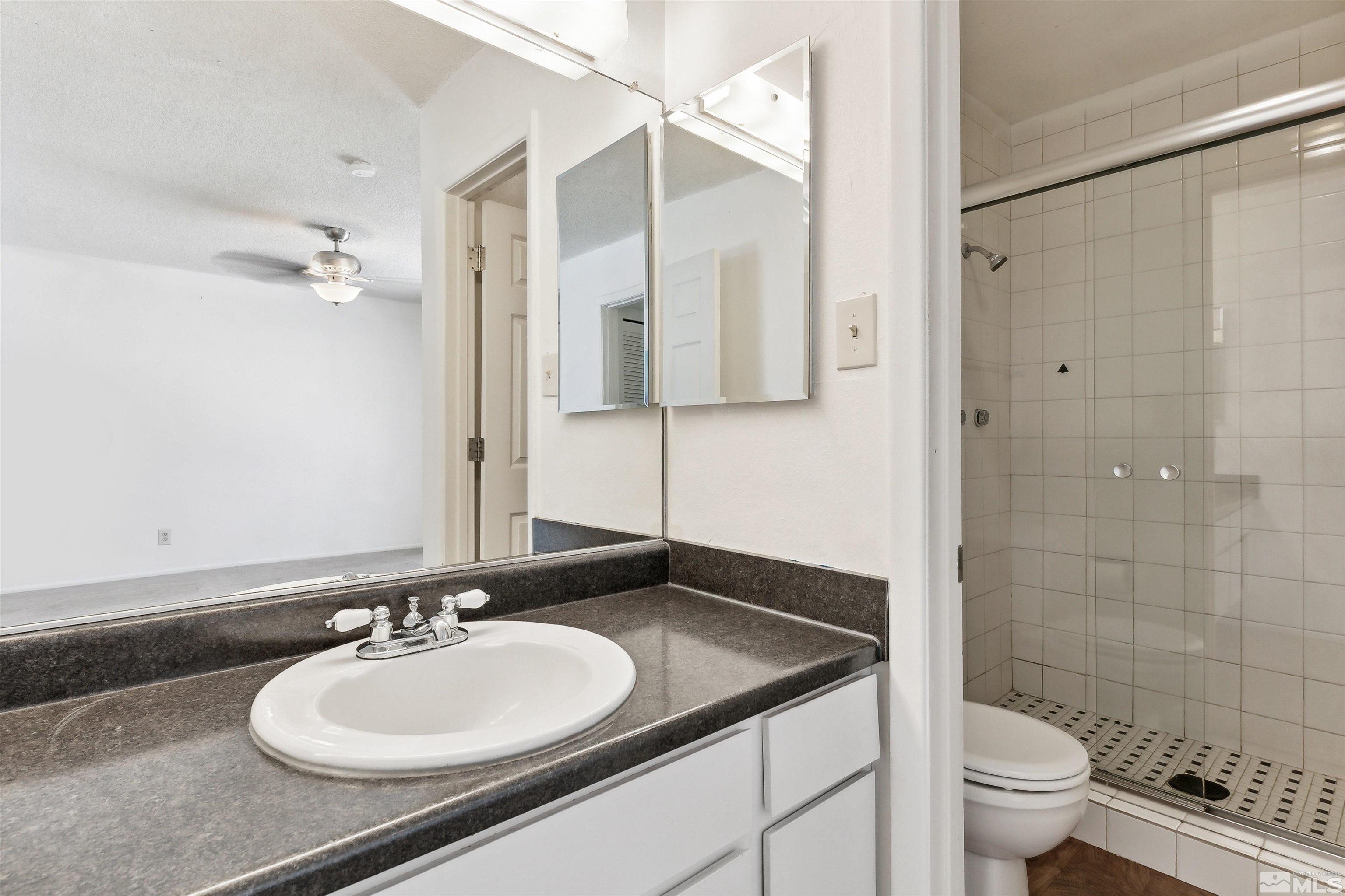1950 Prince Way Reno, NV 89503 - Photo 16 of 17 a bathroom with a sink toilet and shower