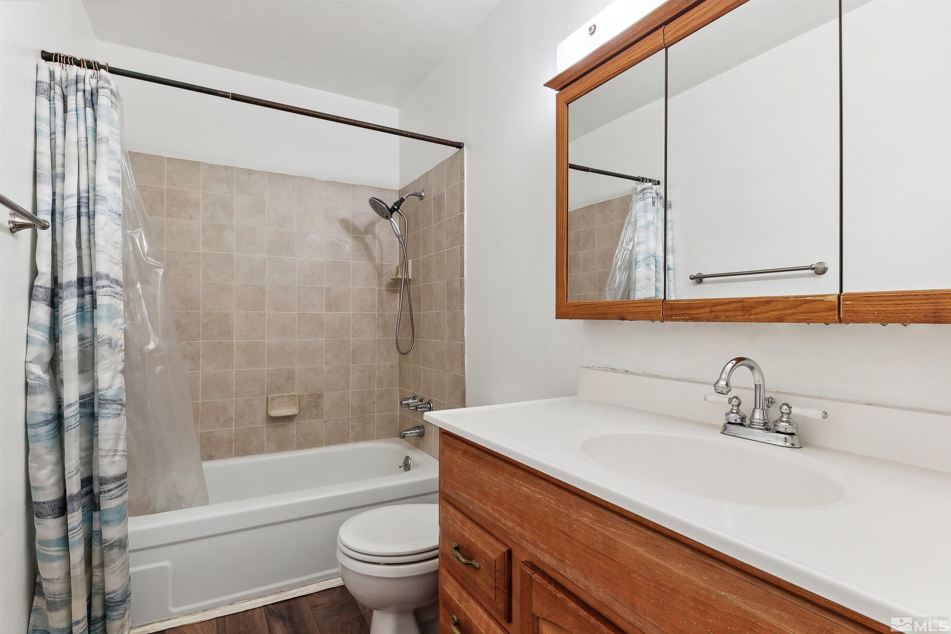 1950 Prince Way Reno, NV 89503 - Photo 17 of 17 a bathroom with a sink a toilet and a bathtub