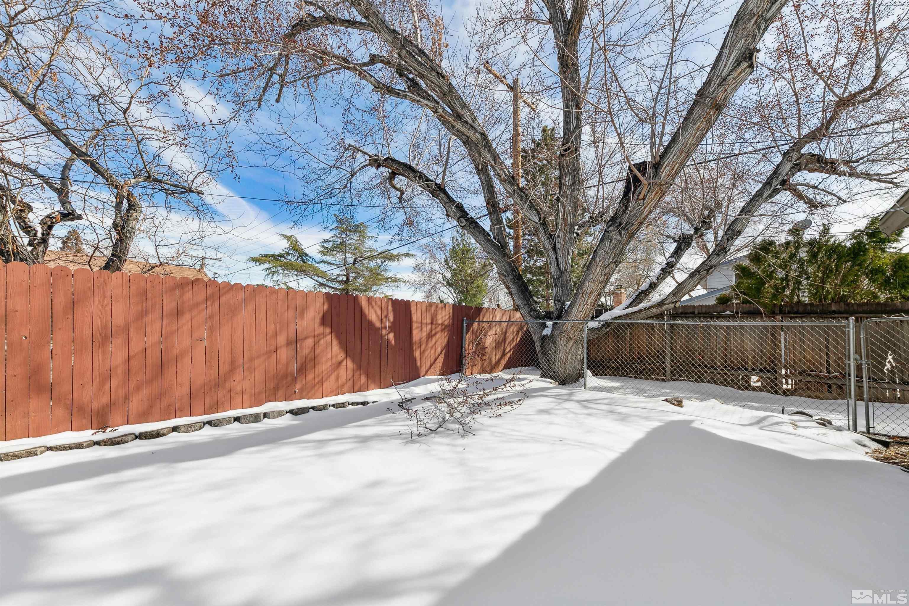 1950 Prince Way Reno, NV 89503 - Photo 4 of 17 a view of backyard with wooden fence