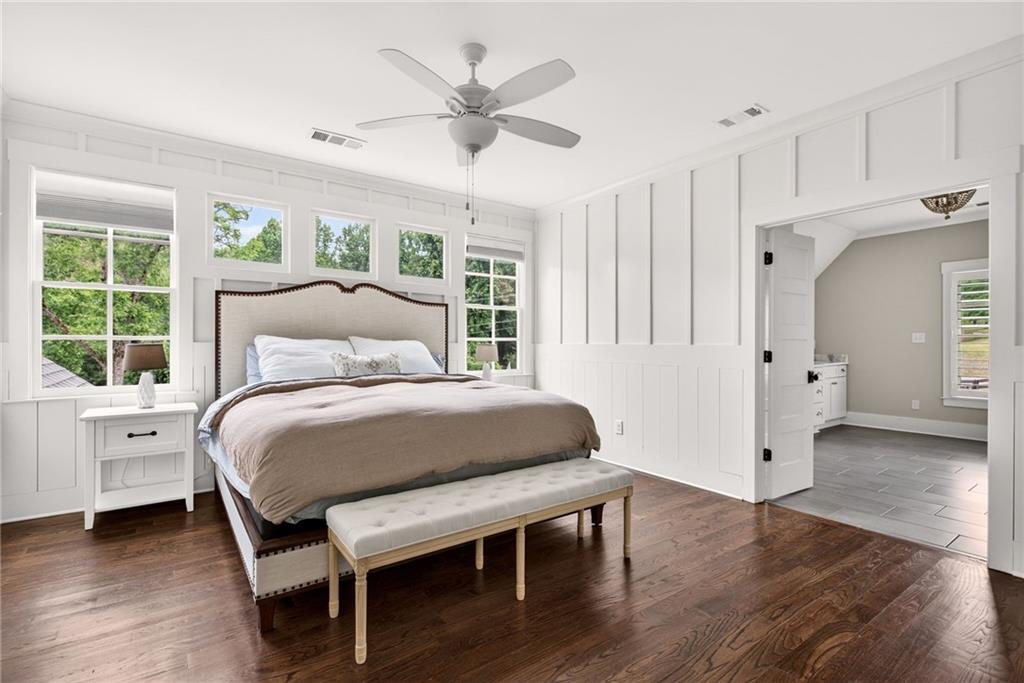 13460 New Providence Road Milton, GA 30004 - Photo 24 of 60 a bedroom with a large bed and a window