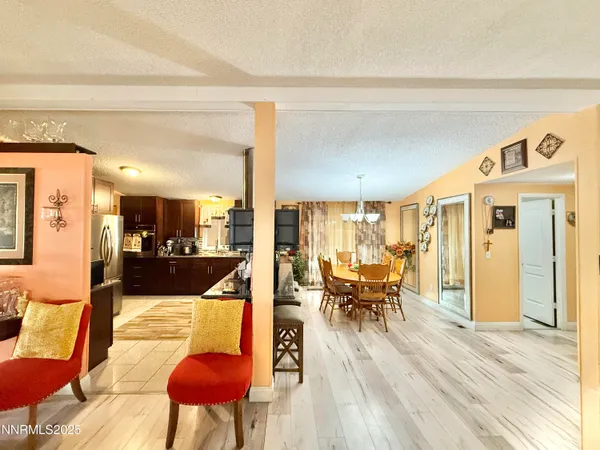 a living room with lots of furniture and view of living room